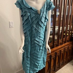 Beautiful London Times dress never worn in shimmering mermaid green.